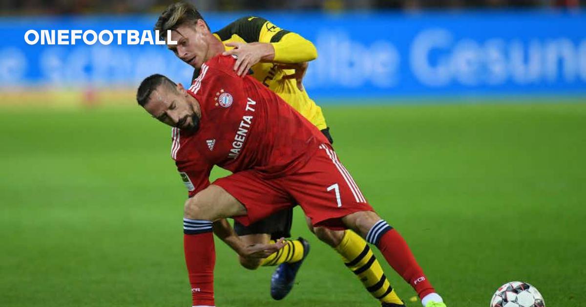 Munich's Franck Ribery seen with a ripped jersey during an