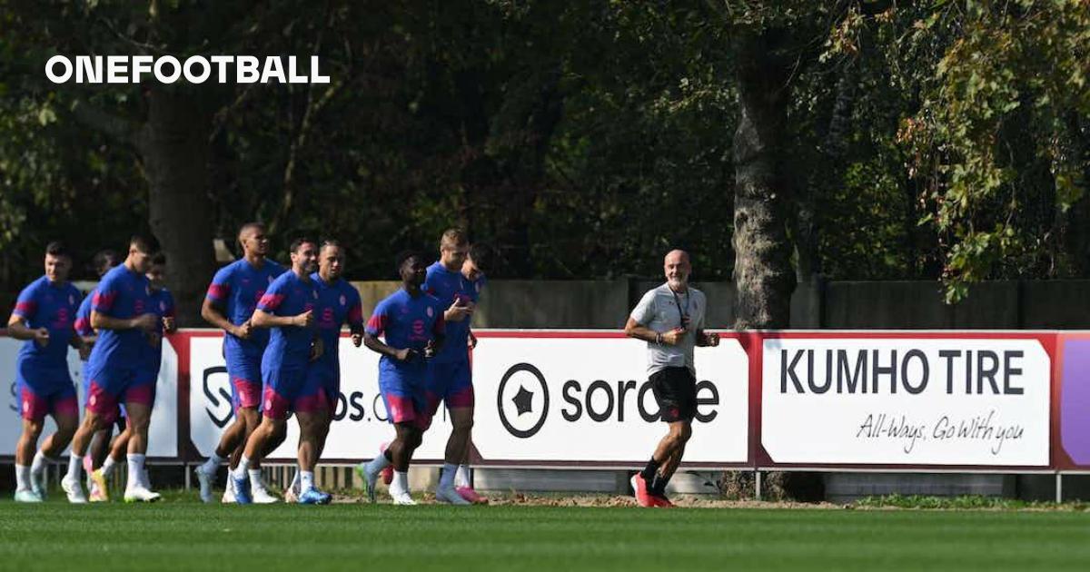 AN AC Milan Ultra use a megaphone to encourage fans to sing during