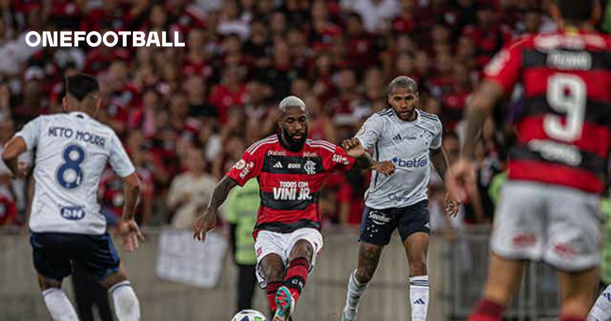 Wesley and Lucas Silva of Cruzeiro and Gerson of Flamengo fight